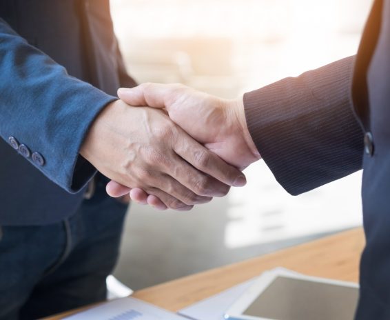 two-confident-business-man-shaking-hands-during-meeting-office-success-dealing-greeting-partner-concept two-confident-business-man-shaking-hands-during-meeting-office-success-dealing-greeting-partner-concept